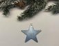 Acrylstern hellblau mit Goldsprenkel